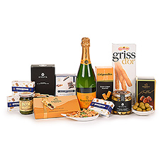 Make a statement of elegance with this prestigious Veuve Clicquot Champagne and gourmet gift hamper. The Veuve Clicquot Brut is composed of 62% pinot noir, 8% pinot meunier, and 30% chardonnay. A classic and desirable Champagne to savor and share, enjoy its lively and persistent sparkle with our impressive collection of European fine foods.