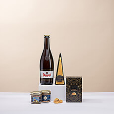 Un coffret cadeau luxueux avec une grande bouteille de Duvel, du fromage Reypenaer V.S.O.P, des biscuits au Gouda de Buiteman et du pâté à la bière de De Veurn Ambachtse.