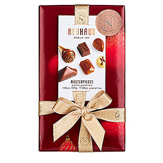 Chocolate is always a hit. This festive Christmas gift ballotin offers an exquisite assortment of the finest Neuhaus pralines with milk, dark, and white Belgian chocolate.