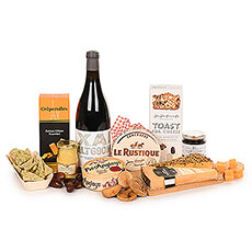 Spend a relaxing evening by the fireplace enjoying a nice glass of red Rioja wine from Spain paired with a rich collection of fine cheeses and complementary mustard, crackers, spread, cookies and dried fruits.