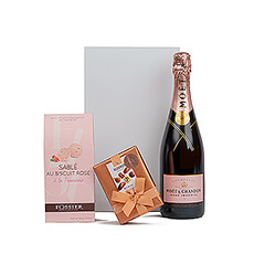 Surprise her with this uplifting pink gift featuring Moët & Chandon Rosé , Fossier Sable Rose Biscuits Framboise, and luxury Neuhaus Belgian chocolates.