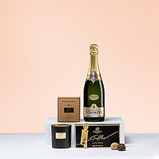 Experience sophisticated luxury in this chic gift set featuring Pommery Grand Cru Royal Millésimé Champagne, an Atelier Rebul Candle, and Godiva Belgian chocolate truffles. It is a memorable gift for any occasion.