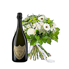 Nous vous présentons ce bouquet élégant, tout en blanc, accompagné d'une bouteille exclusive de champagne Dom Pérignon Vintage 2012 pour une expérience cadeau de luxe.