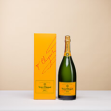 A big bottle of champagne for a big celebration! Gift this Magnum bottle of Veuve Clicquot Brut Champagne to someone very special. Presented in a stylish Yellow Label gift box to match the 1,5 liter bottle inside. Enough delightful champagne for a festive occasion with large group of people you love.