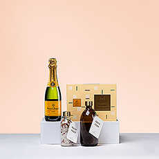 Style, quality, and well-being are combined in this premium gift. Give someone special the gift of peaceful pampering with the perfect combination of Wellmark spa treatments, luxury Veuve Clicquot Champagne, and delicious Godiva chocolate. It's the perfect gift for couples or anyone who could use some "me-time."