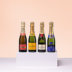 This luxury Champagne tasting experience is a spectacular gift to give or to receive. A quartet of four 37.5 cl half bottles of top French Champagne brands are elegantly presented in a stylish gift box. Revel in the festive classic Champagnes by Veuve Clicquot, Moët & Chandon, Piper-Heidsieck, and Pommery.