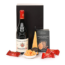 This elegant gift of red wine and snacks will please every palate. The intense Reypenaer VSOP matured cheese, Verduijn&#39;s black pepper & seasalt crackers and some Côte d&#39;Or milk chocolate Bouchées are paired with a fine bottle of Usseglio Châteauneuf-du-Pape. A food-friendly and fruit driven red wine, this California Cabernet is complex and supple with aromas of concentrated blackberry and cassis. Enjoy at the end of a long day, or as a welcome start to a group celebration. The perfect gift for any wine lover.