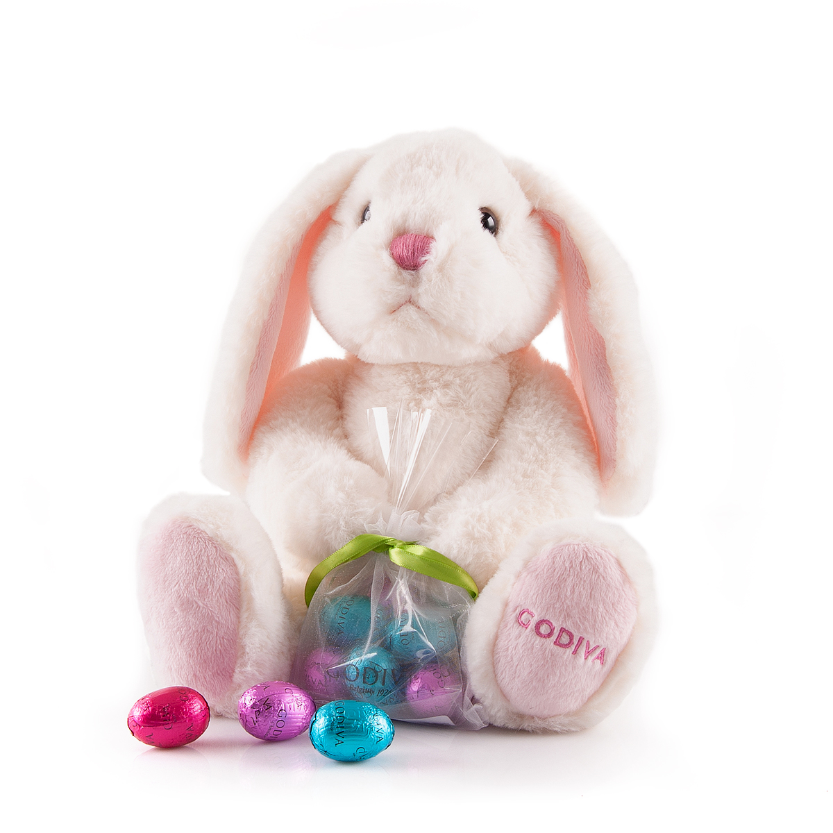 A lovable fluffy Easter bunny with 8 milk and white Godiva chocolate eggs is an Easter gift to be cherished.